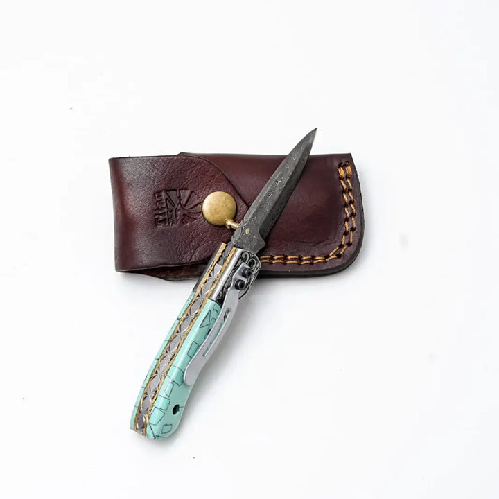 Turquoise Damascus Folding Knife – Hand Engraved Bolster Edition