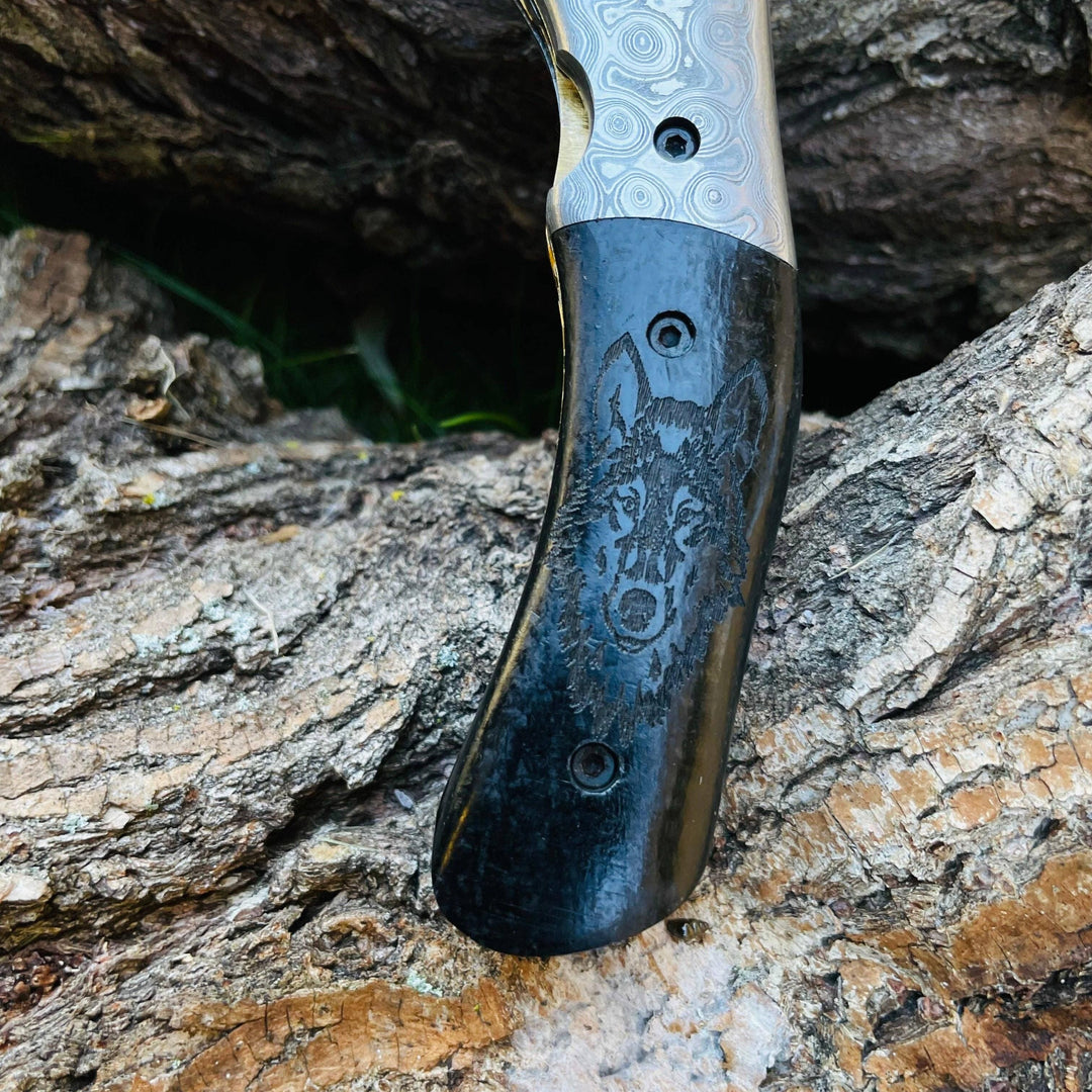 Damascus Steel Folding Knife Wolf Engraved