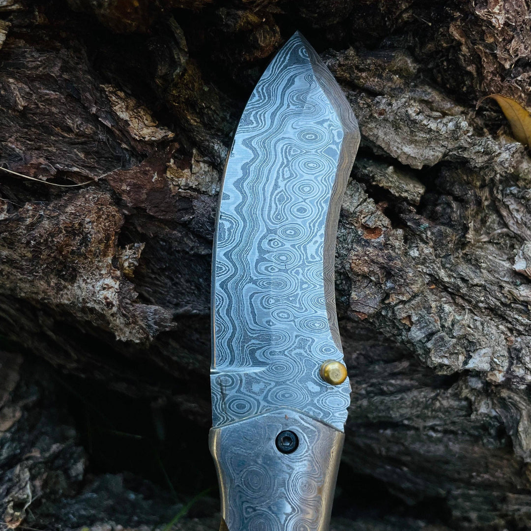 Damascus Steel Folding Knife Wolf Engraved